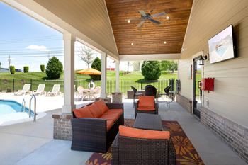Outdoor pavilion with flat screen tv, and food area